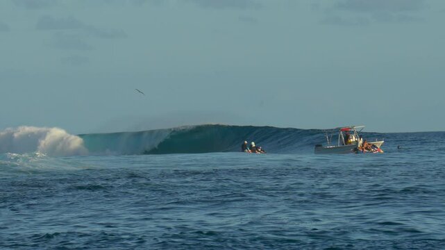 Tahiti Teahupo'o  wave famous surfing barrel French Polynesia foam ball coral reef boats jets Paris summer Olympics 2024 offshore wind Passe Havae Faremahora judge stand Pacific Ocean wide pan