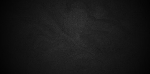 	
Abstract black stone wall texture grunge rock surface. dark gray background backdrop. wide panoramic banner. old wall stone for dark black distressed grunge background wallpaper rough concrete wall.