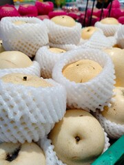 Photos of natural organic ripe Chinese yellow yellow pears. Sweet, fresh and healthy fruit