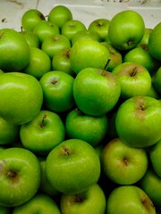 Photo of natural organic ripe sweet green apples. Sweet, fresh and healthy fruit.