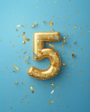 top view of a golden number five - anniversity celebration background