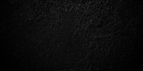 Abstract black stone wall texture grunge rock surface. dark gray background backdrop. wide panoramic banner. old wall stone for dark black distressed grunge background wallpaper rough concrete wall.