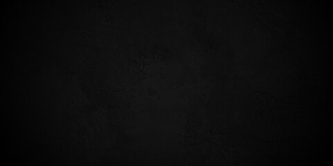 Abstract black stone wall texture grunge rock surface. dark gray background backdrop. wide panoramic banner. old wall stone for dark black distressed grunge background wallpaper rough concrete wall.