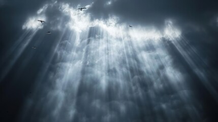 Fototapeta premium Birds ascend through illuminated breaks in clouds symbolizing freedom