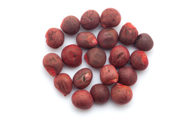 Close-up of Dried Organic Lady Finger (Abelmoschus esculentus) seeds, isolated on a white background. Top view.