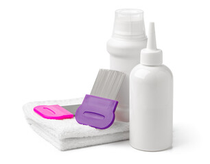 Comb, anti lice medicine and towel on white background