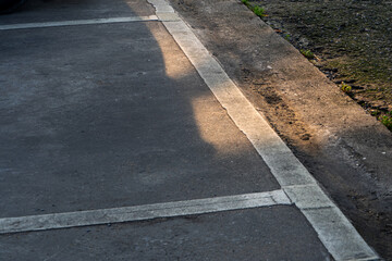 White lines on the concrete floor Divide space on the parking lot