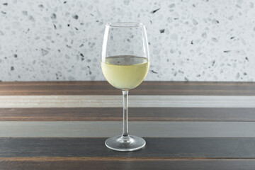 A view of a glass of white wine.