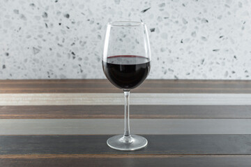 A view of a glass of red wine.