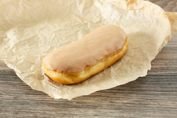 A view of a maple bar donut.