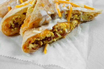 A closeup view of a breakfast quesadilla.