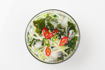 A food made by cutting cucumbers into small pieces, pickling them in salt or soy sauce, adding them...