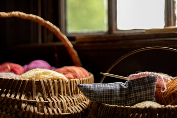 yarn in baskets on a windowsill