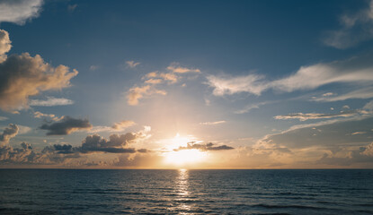 Beautiful sunrise or sunset at sea. Sunrise sea on tropical beach. Landscape of beautiful beach. Beautiful sunset at sea. Ocean sunset on sky background with colorful clouds.