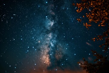 Obraz premium A view of a dark night sky showcasing numerous stars and the Milky Way galaxy, A starry night sky with the Milky Way stretching across it