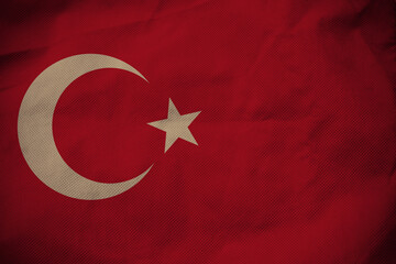Obraz premium Turkey nation flag on crumpled fabric background , country flag