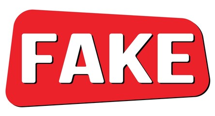 FAKE text on red trapeze stamp sign.