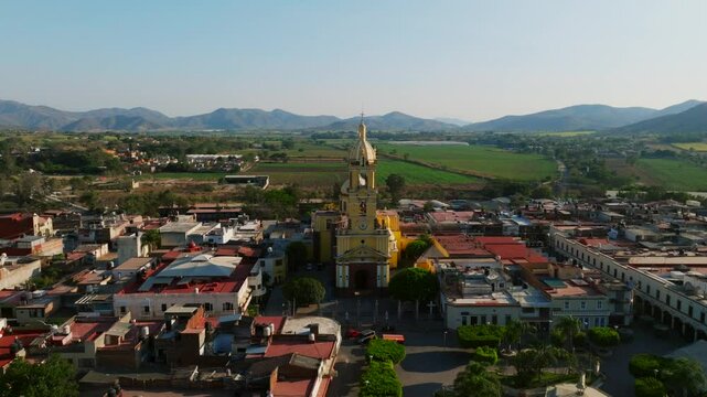 Dolly in drone shot of Our Lady of the Sanctuary church facade in Tamazula, Mexico