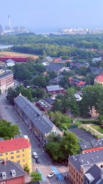 Panoramic aerial view with panning left movement of Christianshavn district from Vor Frelsers Kirke church over central Copenhagen. Copenhagen, Denmark