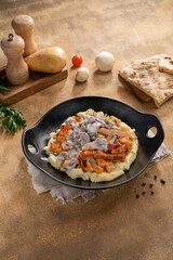 Classic Chicken, Sliced grill chicken and mushroom sauce served with mashed potato.