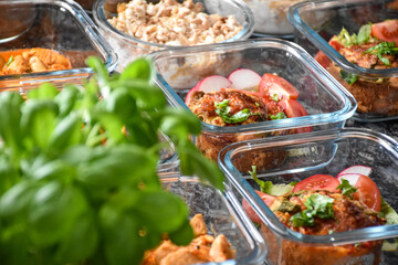 Glass boxes with food for the day