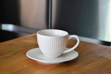 Ceramic white mug with saucer