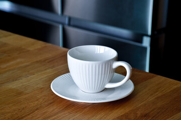 Ceramic white mug with saucer