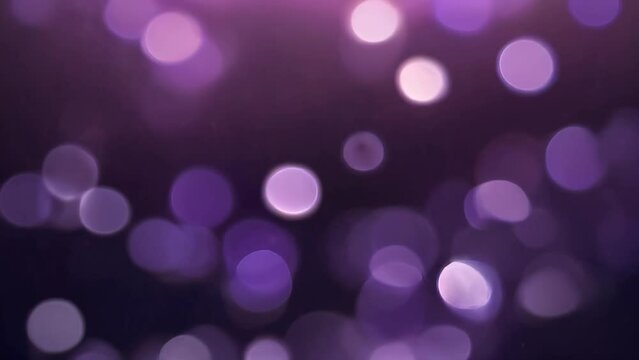 beautiful bokeh purple lights background. The soft, glowing orbs create a dreamy and festive atmosphere, perfect for celebratory backgrounds