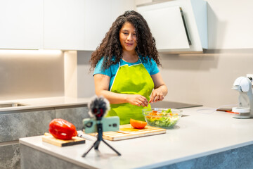 Woman making online vlogg of healhty food from home