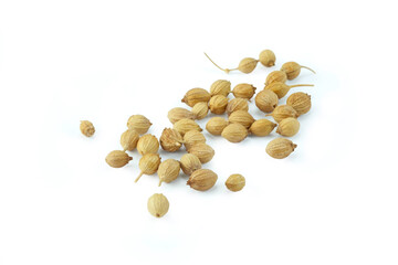 Dried coriander seeds isolated on white background with clipping path top view flat lay. Pale white and pale brown in colors, have aroma essential oil, used as a spice. Herb and spice concept.