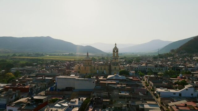 Profile side view of Our Lady of the Sanctuary Church in Tamazula. Aerial dolly in drone flight
