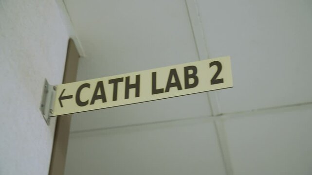Slow Pan to Hospital Cath Lab Sign - Slow Motion - 4K UHD
