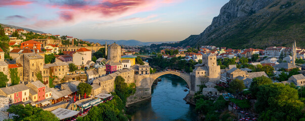 Stari Most bridge at twilight in old town of Mostar, Bosnia and Herzegovina. Mostar cityscape at...