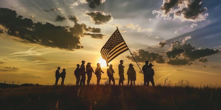 A group of people are standing in a field holding a flag