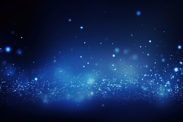 Fototapeta premium A sinuous wave of blue particles interspersed with points of light against a dark backdrop, conveying motion and energy.