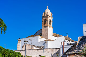 Bell tower of the Church of Saint Lucia in Alberobello, Italy