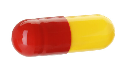 One antibiotic pill isolated on white. Medicinal treatment