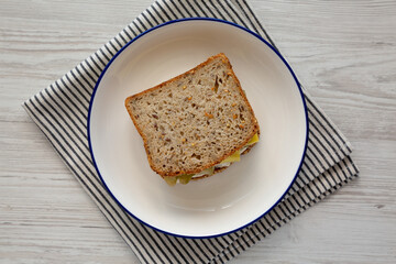 Homemade Pickle Sandwich with Mayo and Cheese on a Plate, top view. Flat lay, overhead, from above.