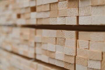 Perspective angle of wooden planks in close-up at a lumber warehouse
