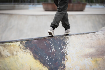 parkour jumping on steel pipe with balance