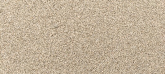 Obraz premium Sand texture. Summer sand. Widescreen texture closeup
