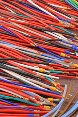 Copper stranded mounting electrical wires in colored insulation for electrical equipment. Close-up. Soft focus.