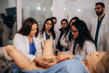 Medical students learn to deliver babies