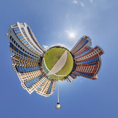 abstract swirling tiny planet spherical panorama of multi-storey buildings of skyscrapers of a...