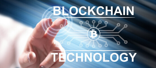 Woman touching a blockchain technology concept