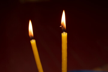 Two burning candles in the church	