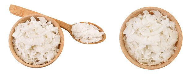 Coconut flakes or chips in wooden bowl isolated on white background. Top view. Flat lay