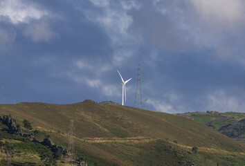 Silhouettes of wind turbines, wind power plants in Portugal, Europe. Ecological, saving energy