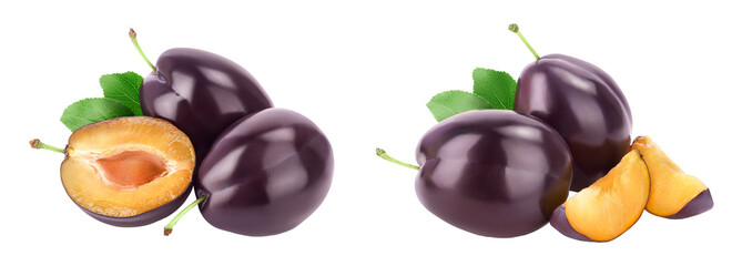fresh purple plum and half with leaves isolated on white background with full depth of field