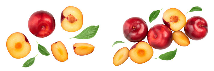 fresh red plum and half with leaves isolated on white background. Top view. Flat lay
